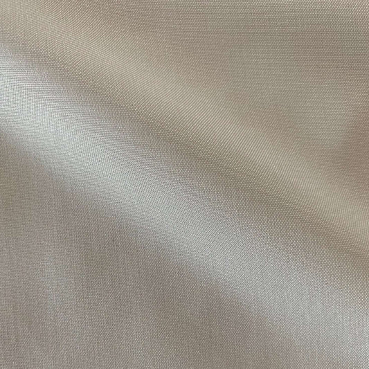 Presenting double fuji a natural colored silk fabric with breathable light weight pure spun silk shirting in closeup