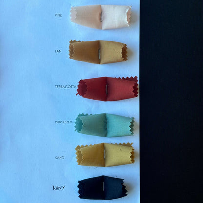 Presenting pink, tan. terracotta. ducegg. sand and navy from the Linus Color Card