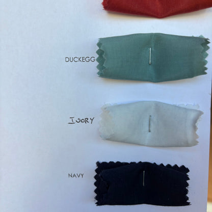Displaying the Linus colors of duckegg, ivory and navy