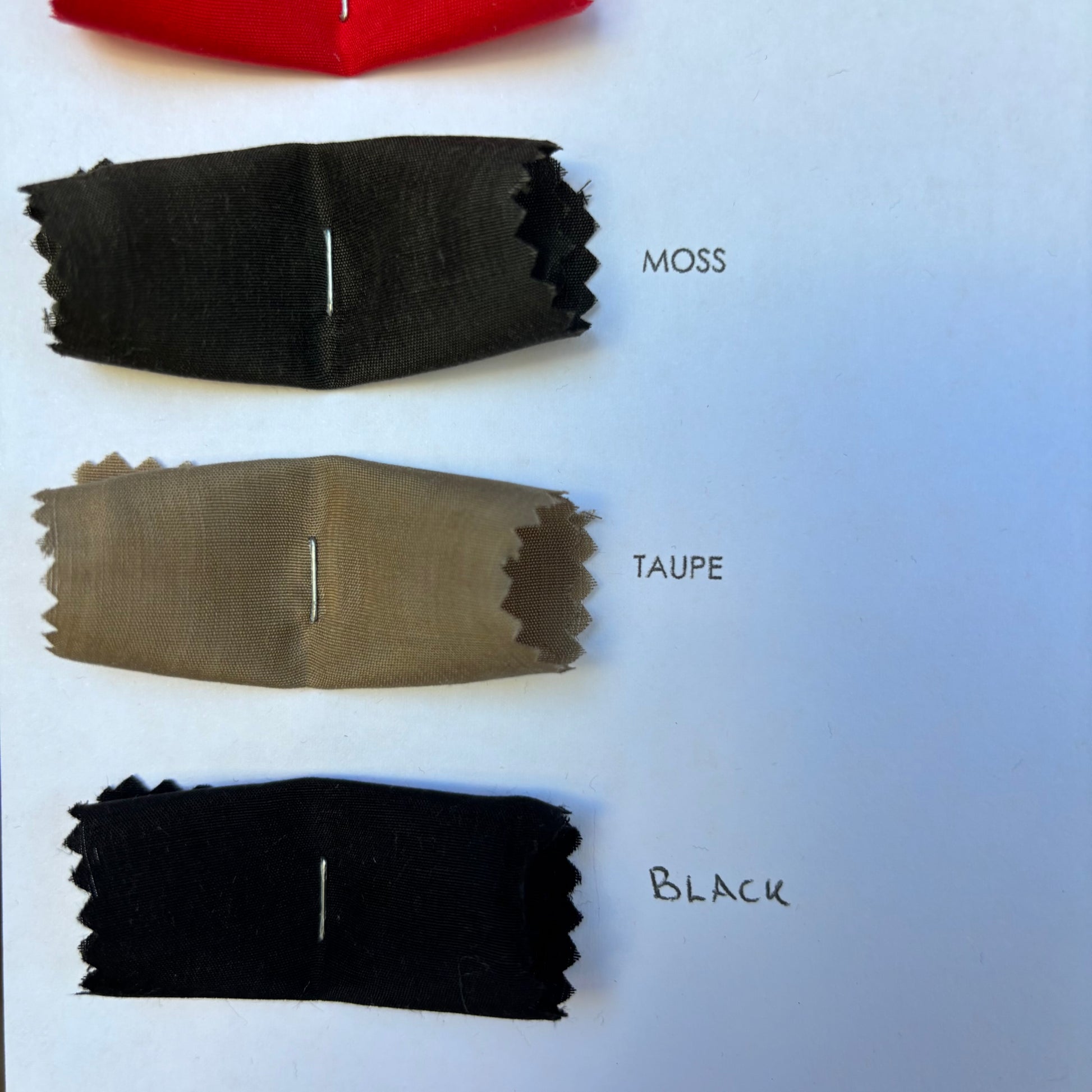 Displaying the Linus colors of moss, taupe and black