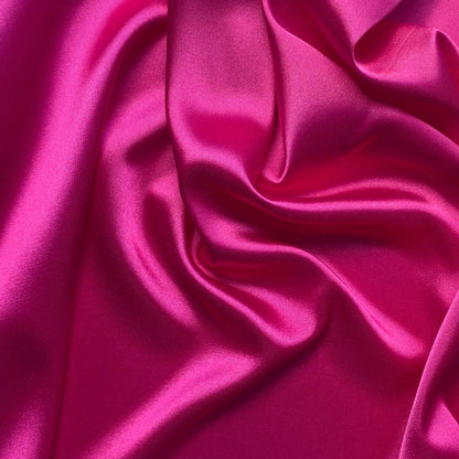 lola presenting the vibe color version of a stretch light weight soft satin polyester with spandex
