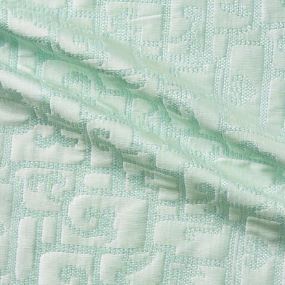 luxor presenting the mint color version of a heavy weight pure silk brocade with abstract Egyptian styled pattern