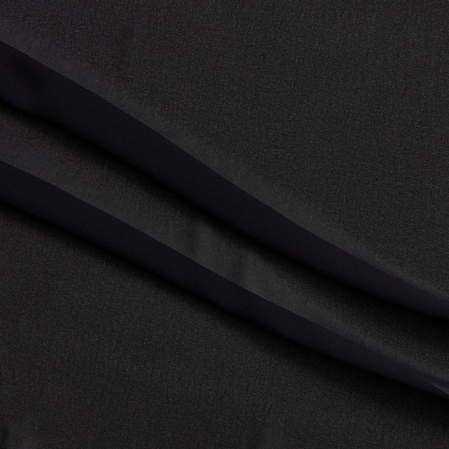 microgette presenting the black color version of a sheer soft plain weave Polyester microfibre with matte face and good drape