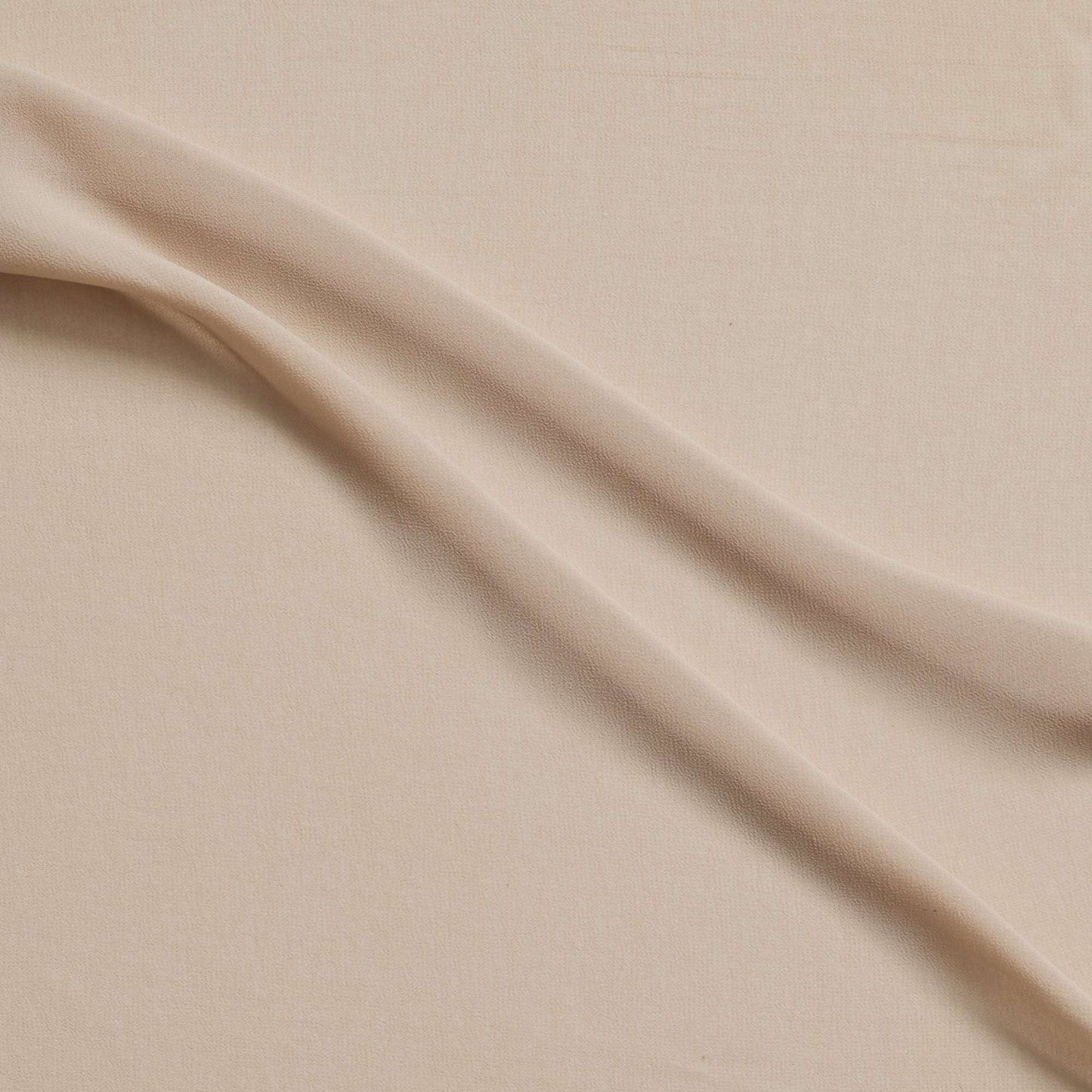 microgette presenting the champagne color version of a sheer soft plain weave Polyester microfibre with matte face and good drape