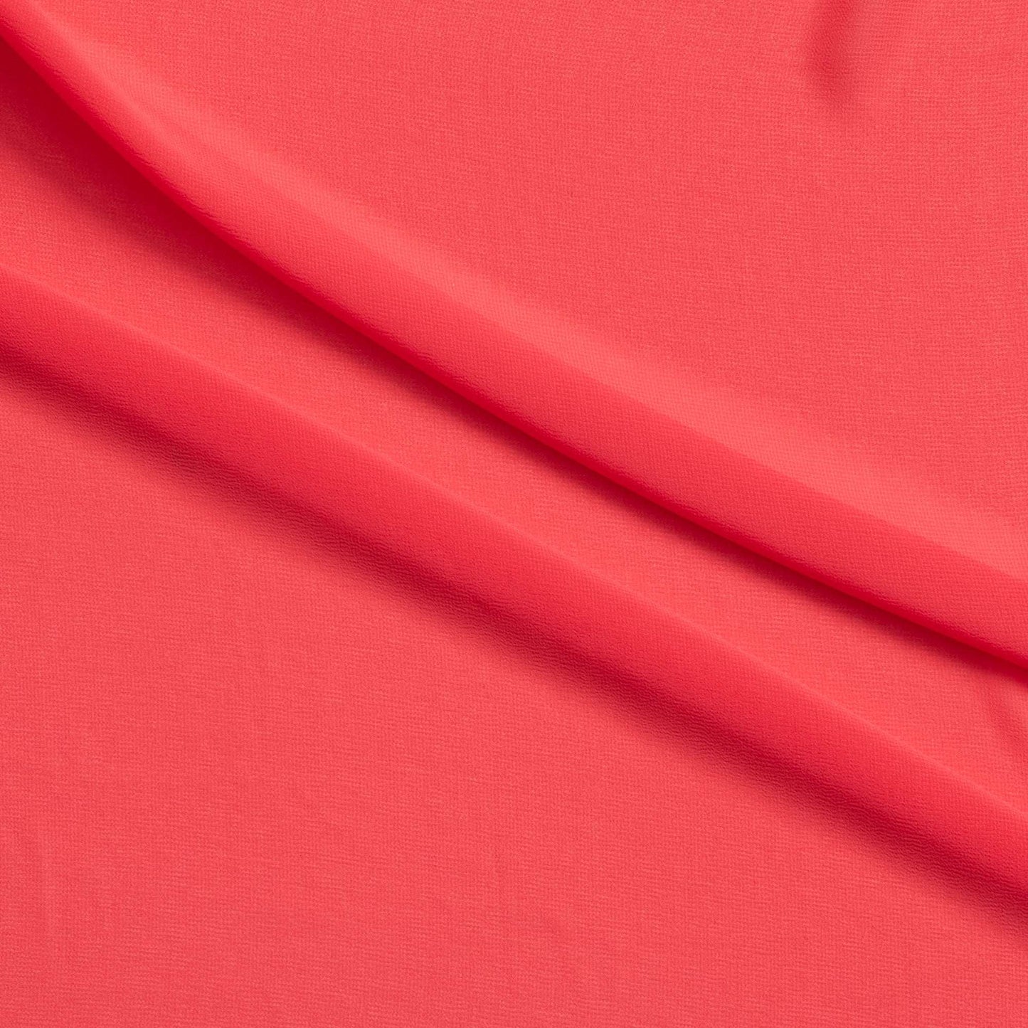 microgette presenting the coral color version of a sheer soft plain weave Polyester microfibre with matte face and good drape