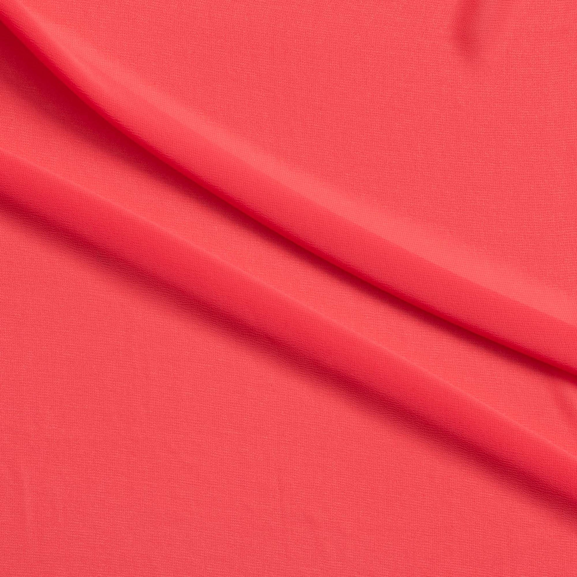 microgette presenting the coral color version of a sheer soft plain weave Polyester microfibre with matte face and good drape