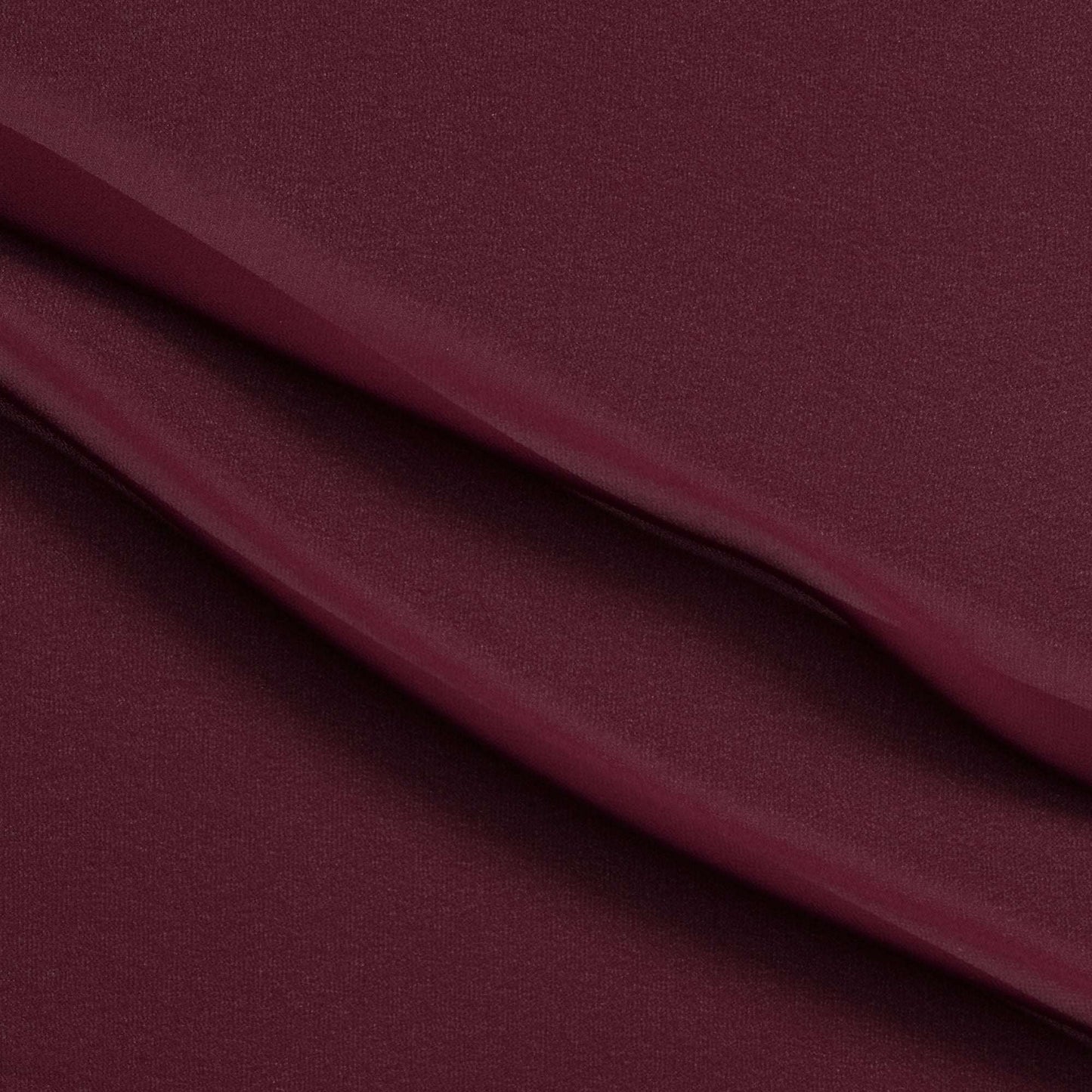 microgette presenting the ruby color version of a sheer soft plain weave Polyester microfibre with matte face and good drape
