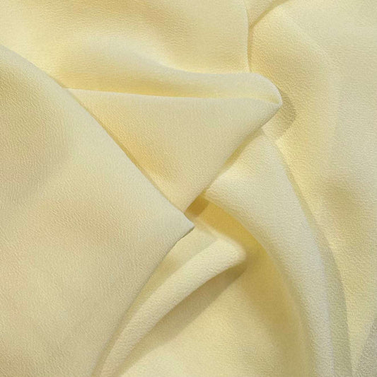 microgette showing the lemon color version of a sheer soft plain weave Polyester microfibre with matte face and good drape