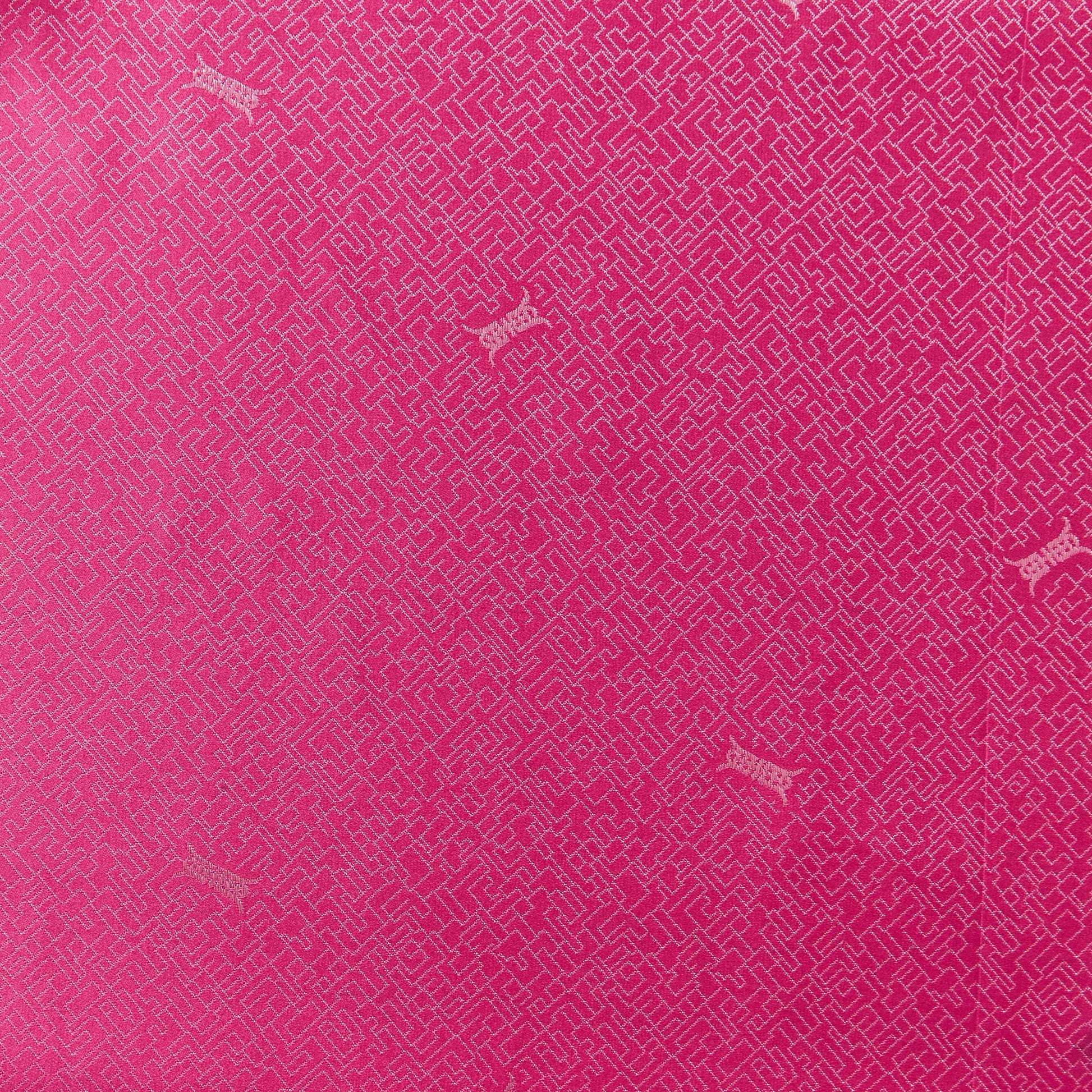 ming presenting the orchid color version of a silk and rayon blend featuring a Chinese inspired jacquard print featuring good drape