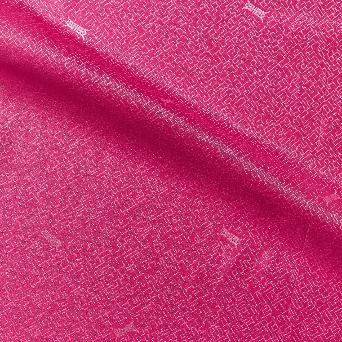 ming presenting the orchid color version of a silk and rayon blend featuring a Chinese inspired jacquard print