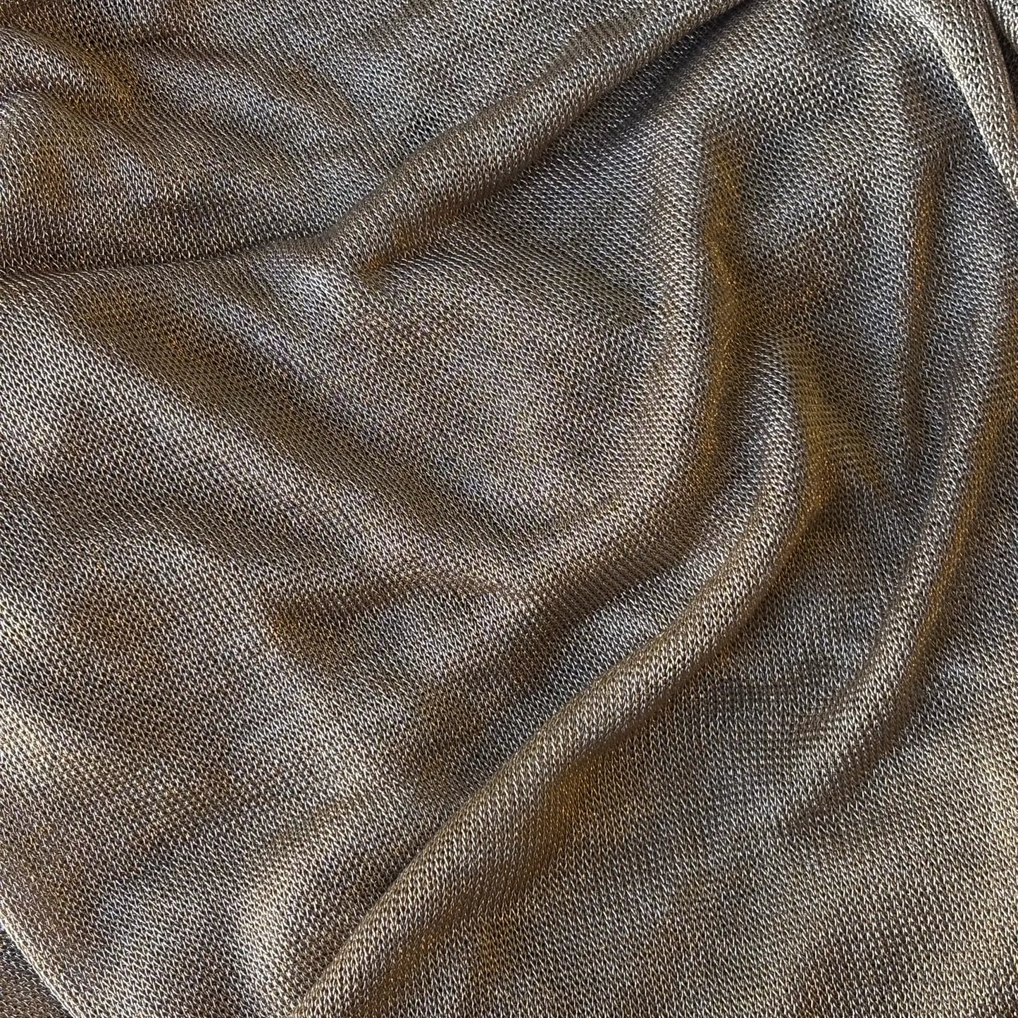 Exhibiting Mithral Bronze a blended fabric of metallic Rayon with added lycra.