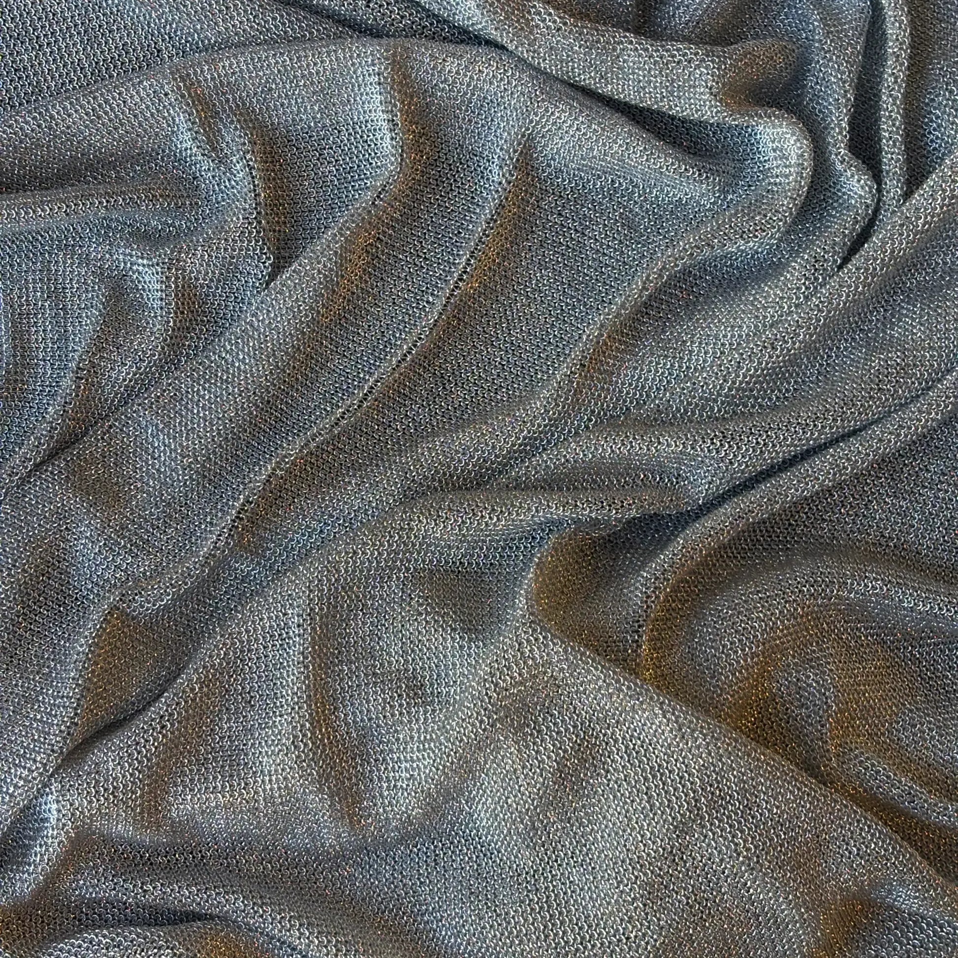 Exhibiting Mithral Silver a blended fabric of metaliic Rayon with added lycra.