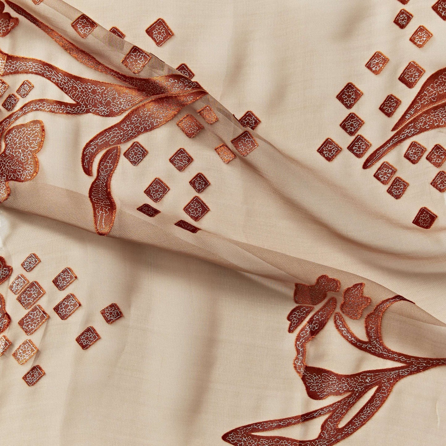 Presenting nirvana a cashew colored soft silk and rayon blended chiffon with floral burnout devoré featuring good drape