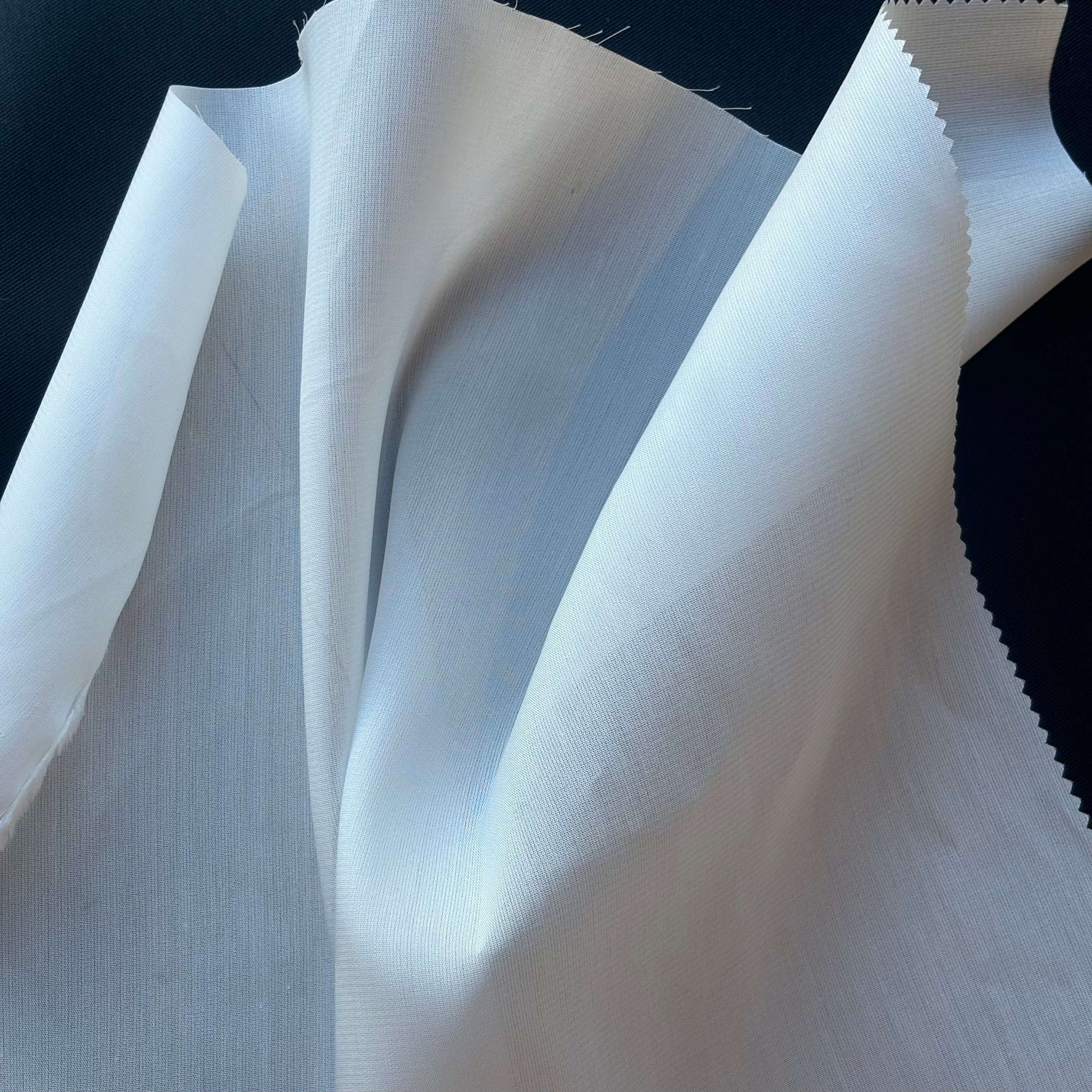 Showing Organdie a white blended stiff tencel and rayon fabric