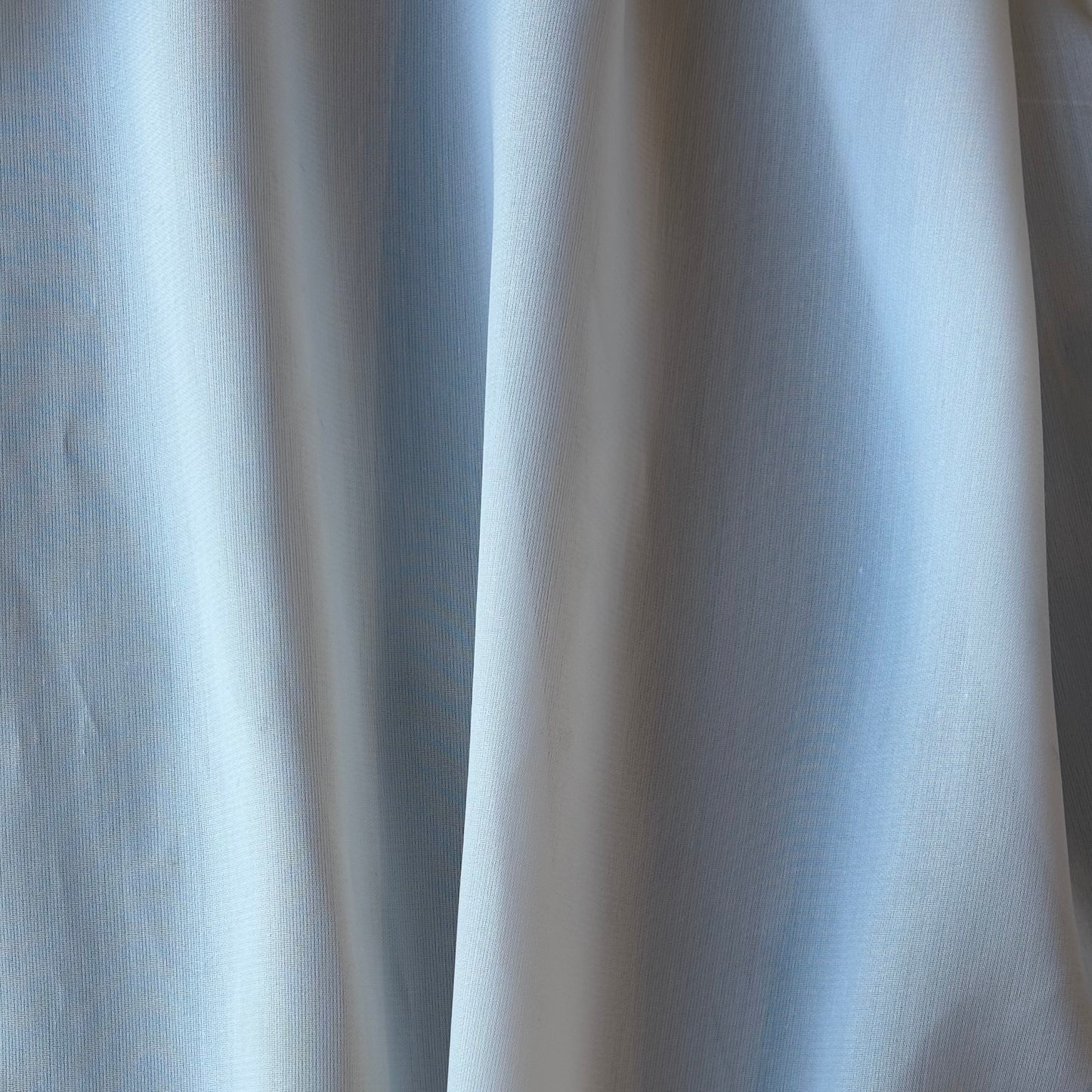 Displaying Organdie a white blended stiff tencel and rayon fabric