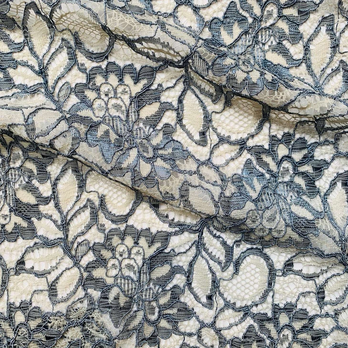 Piccadilly presenting the wedgewood colour. Rochelle antique designed lace with double scalloped edge on a rayon and nylon blend