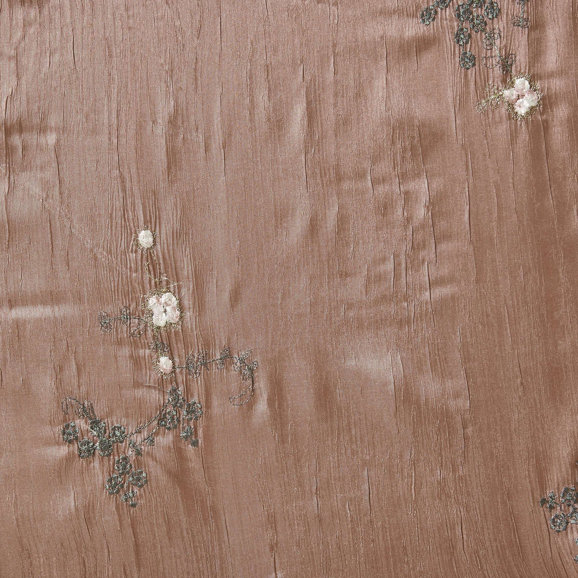 ruby showing the mink color version embroidered with simple floral pattern crisp pure polyester crushed taffeta