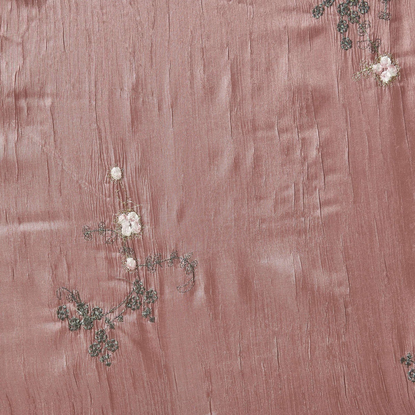 ruby showing the rose color version embroidered with simple floral pattern crisp pure polyester crushed taffeta