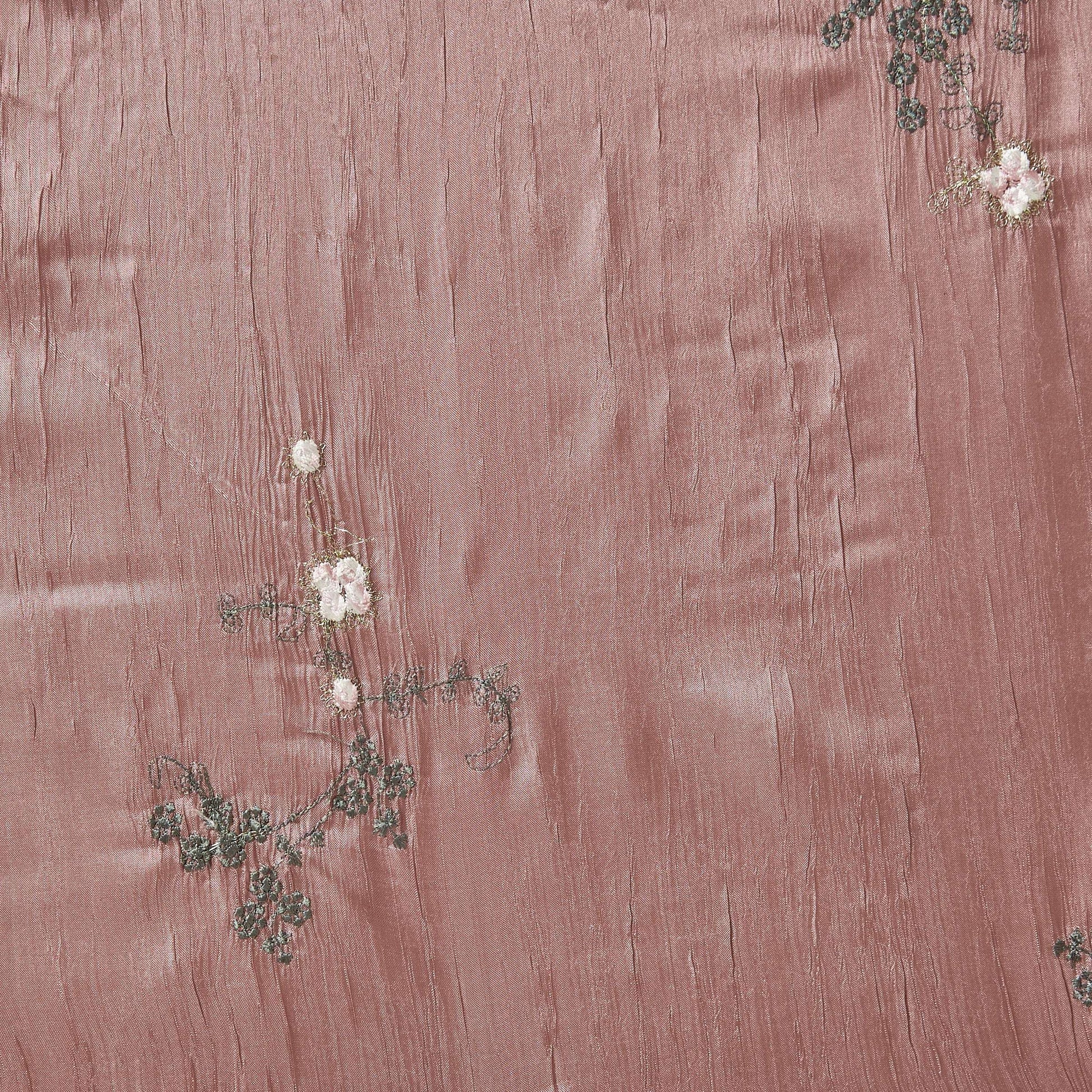 ruby showing the rose color version embroidered with simple floral pattern crisp pure polyester crushed taffeta