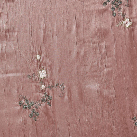 ruby showing the rose color version embroidered with simple floral pattern crisp pure polyester crushed taffeta