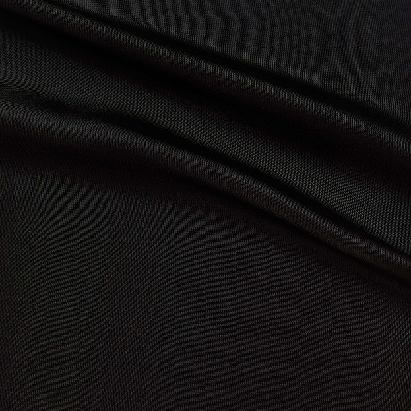 saga showing the black color version of a pure rayon Fine twill satin with fluid drape