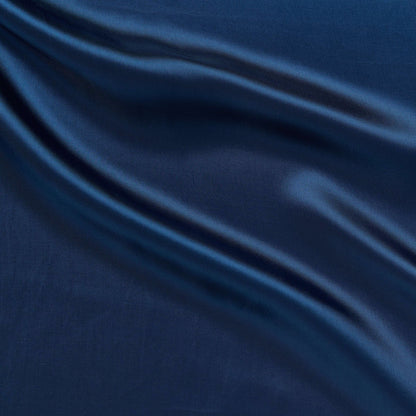 saga showing the cobalt color version of a pure rayon Fine twill satin with fluid drape