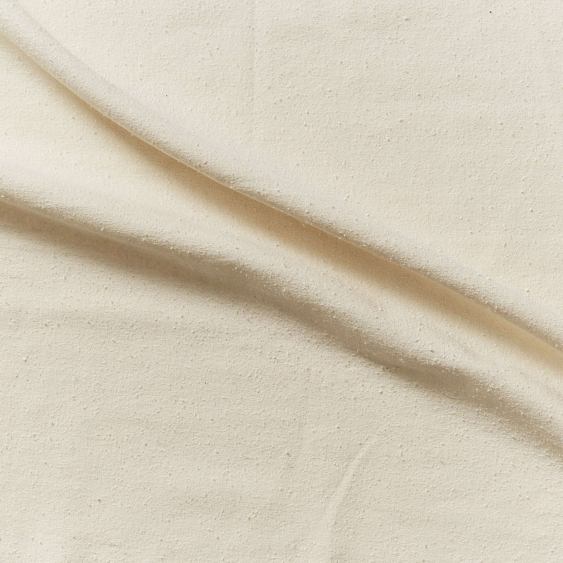 Showing seedy  a natural colored soft and textured face raw pure silk