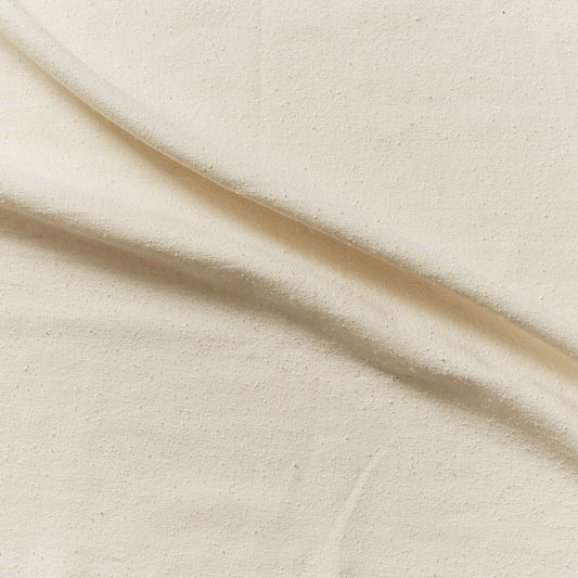 Showing seedy  a natural colored soft and textured face raw pure silk