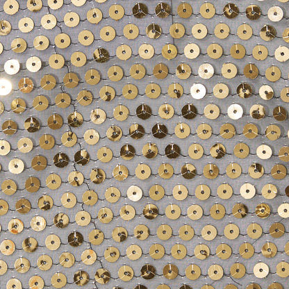 Showing sequin georgette featuring Gold colored sequins on sheer georgette polyester black mesh with good drape