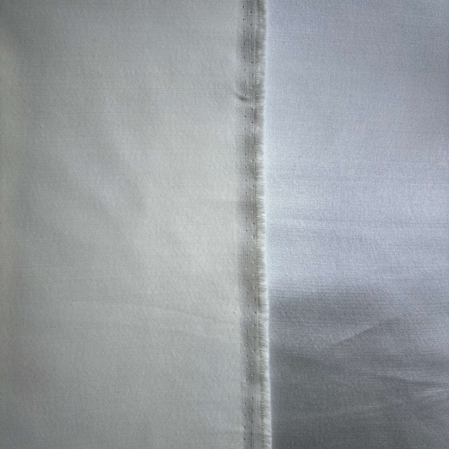 Close up of Silk Wool Sateen showing back side and face side