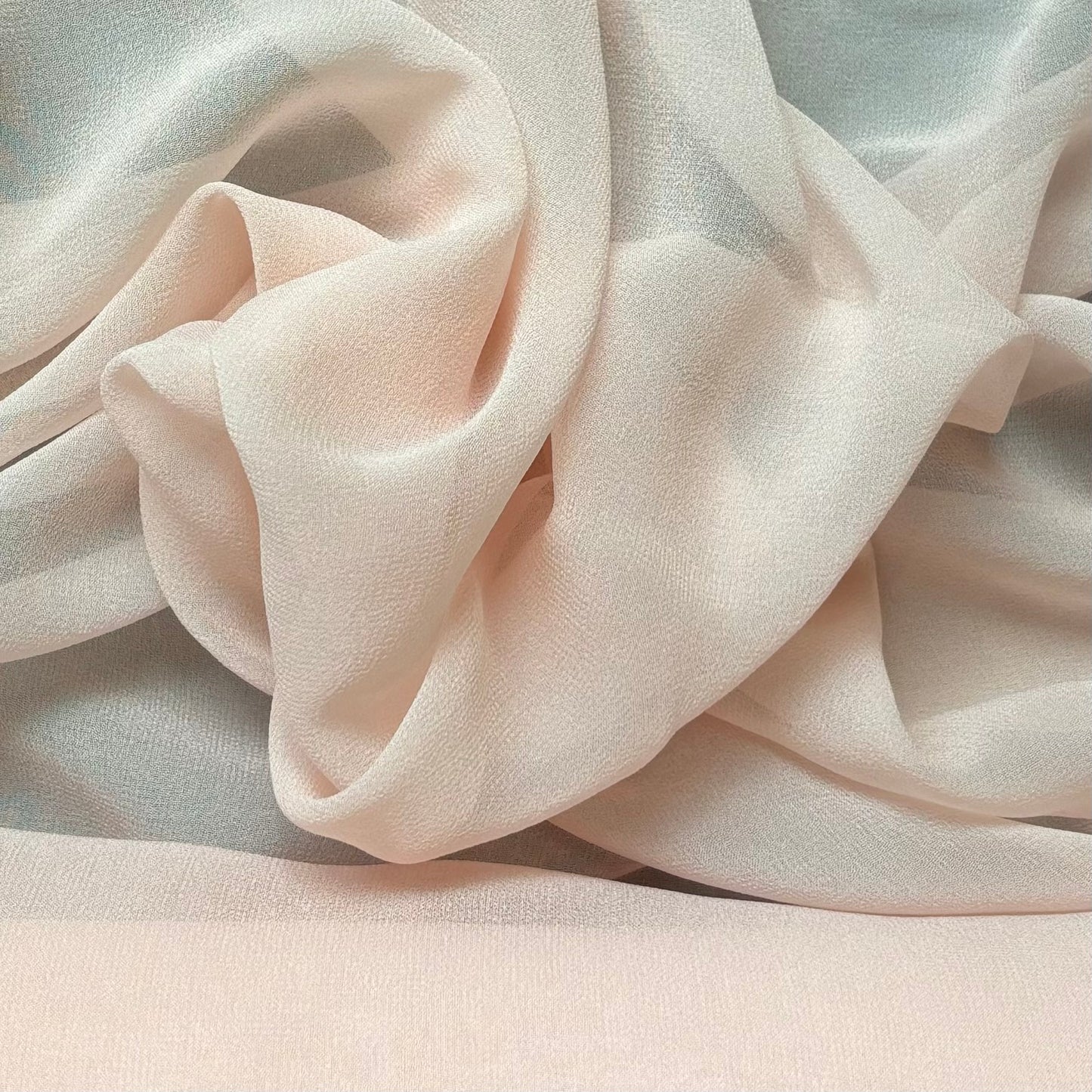 silk georgette featuring the ballet color version of a Lightweight sheer floaty pure silk with excellent drape great for layering and gathering