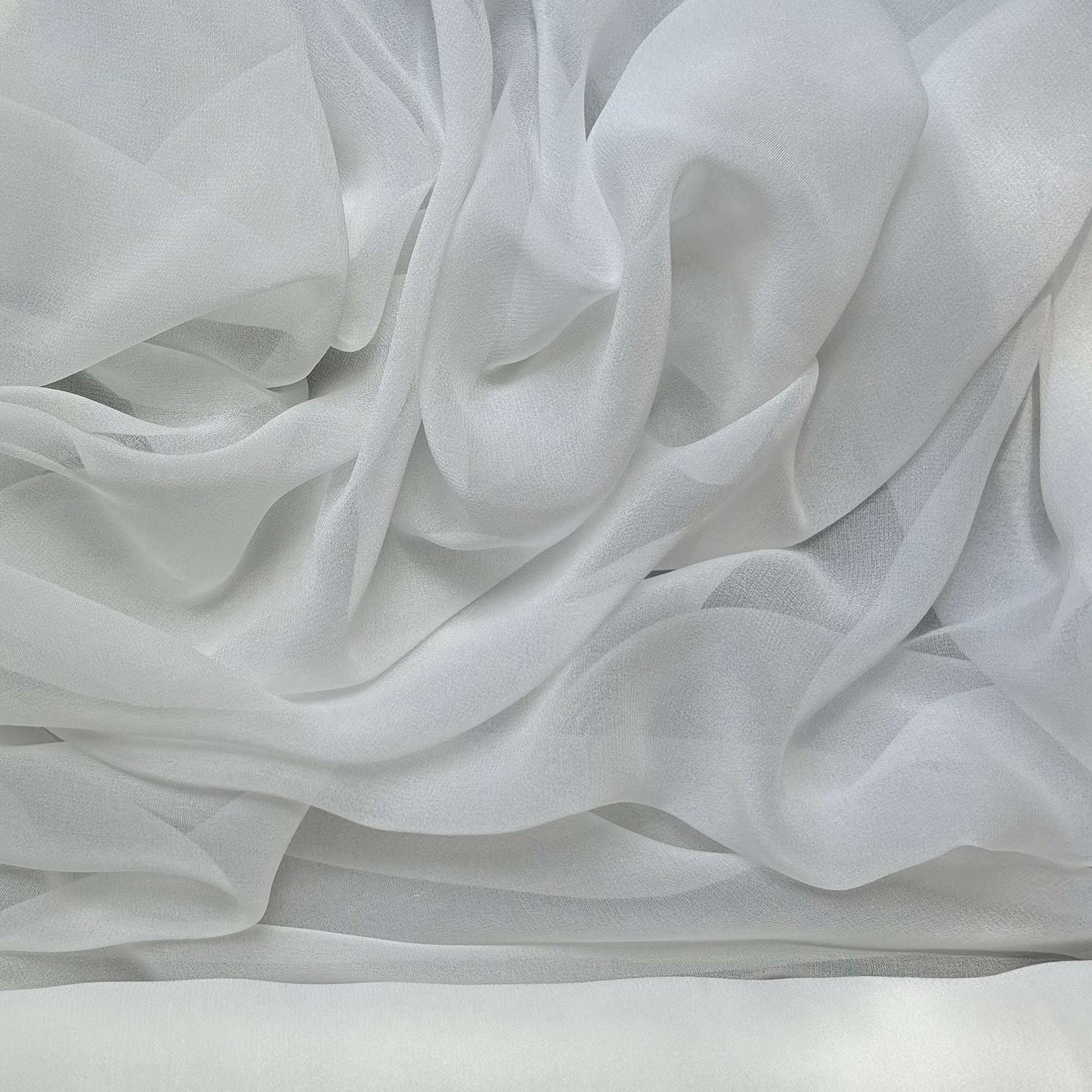 silk georgette showing the natural color version of a Lightweight sheer floaty pure silk with excellent drape great for layering and gathering