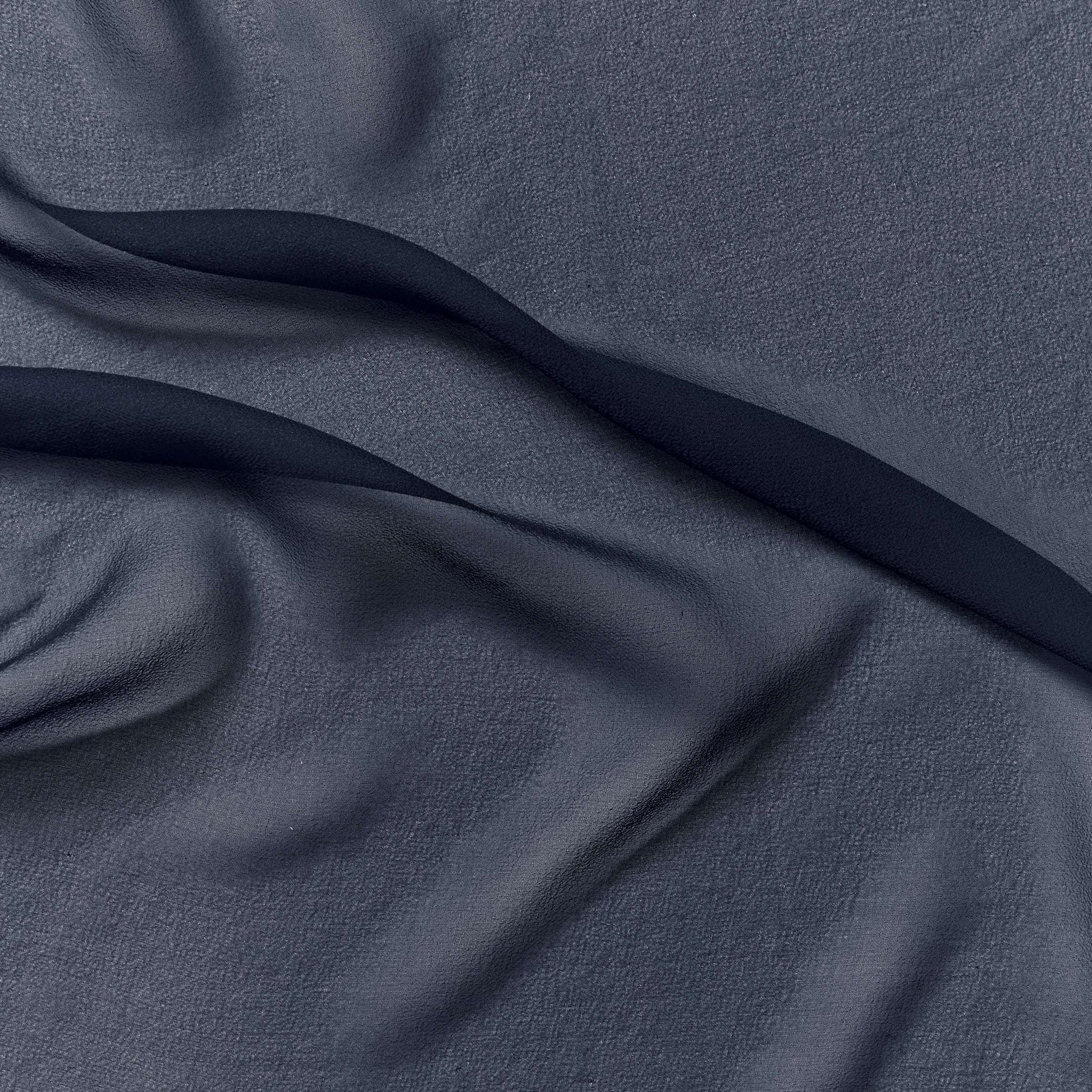 silk georgette showing the navy color version of a Lightweight sheer floaty pure silk with excellent drape great for layering and gathering