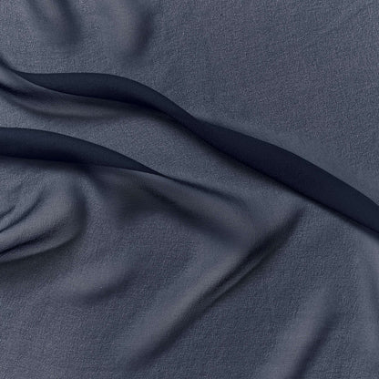 silk georgette showing the navy color version of a Lightweight sheer floaty pure silk with excellent drape great for layering and gathering