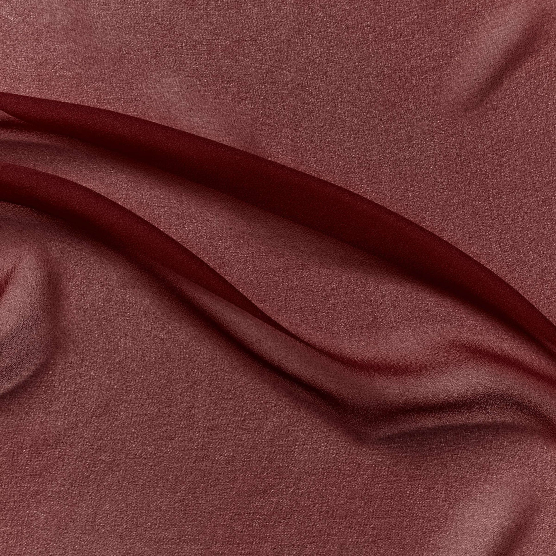 silk georgette showing the ruby color version of a Lightweight sheer floaty pure silk with excellent drape great for layering and gathering