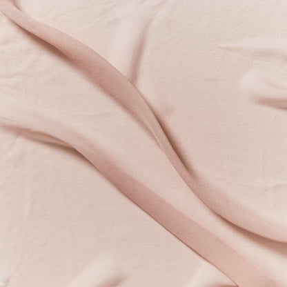 silk georgette showing the salmon color version of a Lightweight sheer floaty pure silk with excellent drape great for layering and gathering