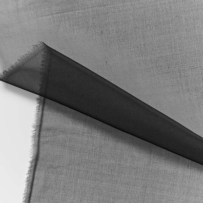 silk organza showing the black color version of a Lightweight stiff sheer pure silk with natural silk sheen