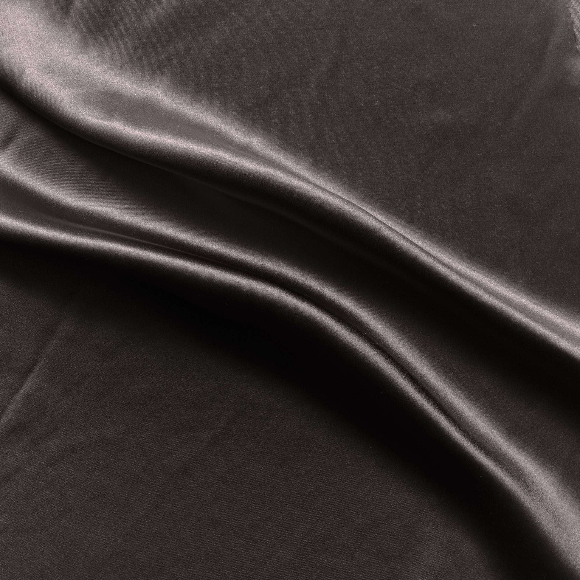 Silk Satin showing the charcoal color version of a pure mulberry silk with natural sheen and fluid drape