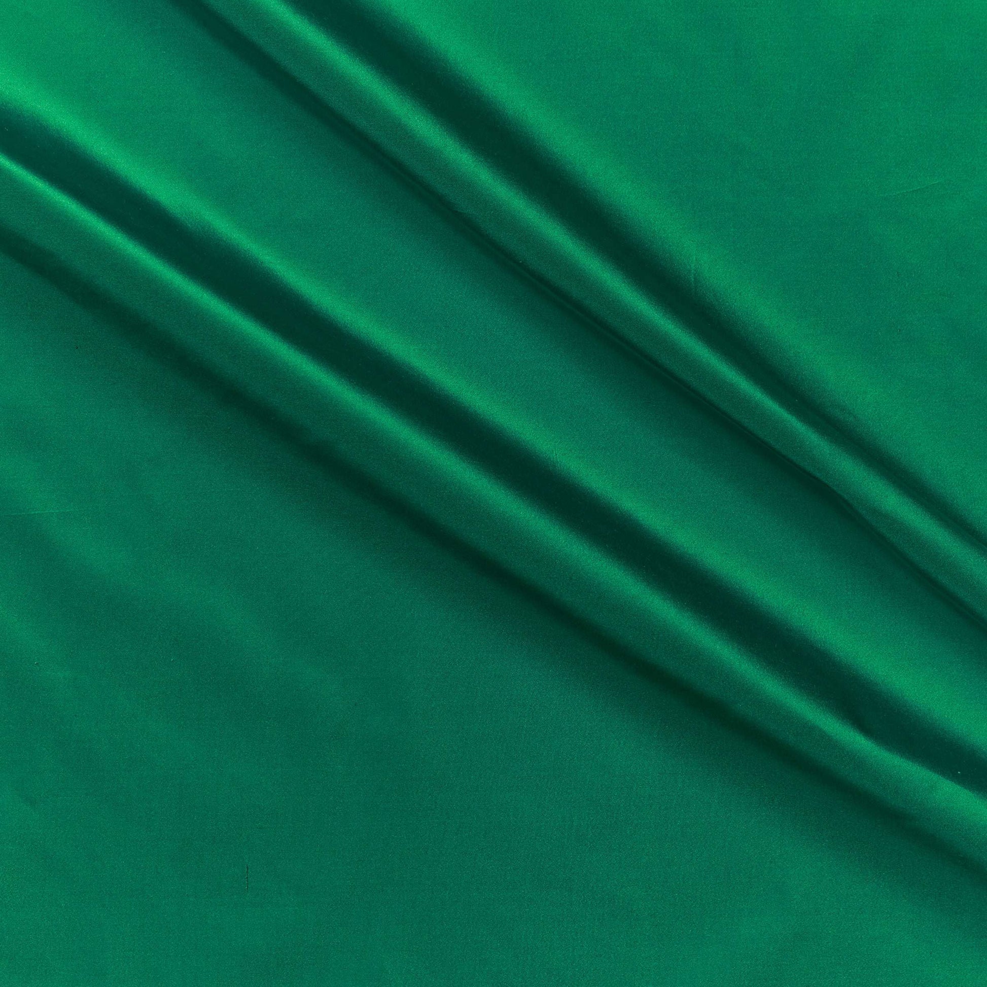silk taffeta colours showing the emerald green color version of a smooth crisp pure silk with good drape