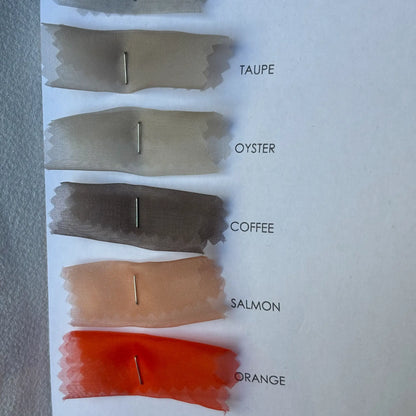 Presenting the selection of  Silk Organza shades oftaupe, oyster, coffe, salmon and orange