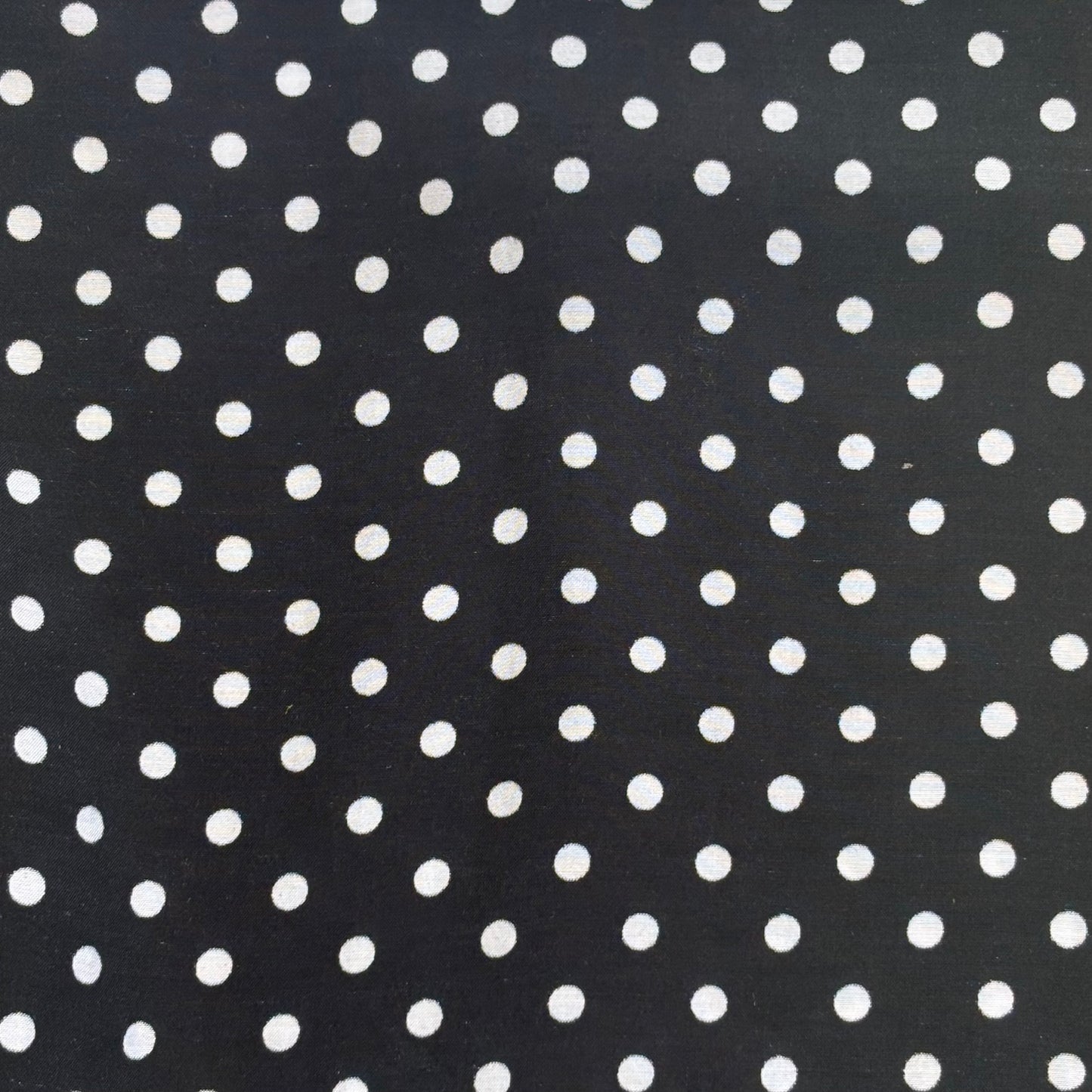 Exhibiting Spotty which features a spot print on a washable silk and rayon blend fabric