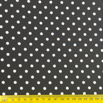 Exhibiting Spotty which features a spot print on a washable silk and rayon blend fabric with ruler