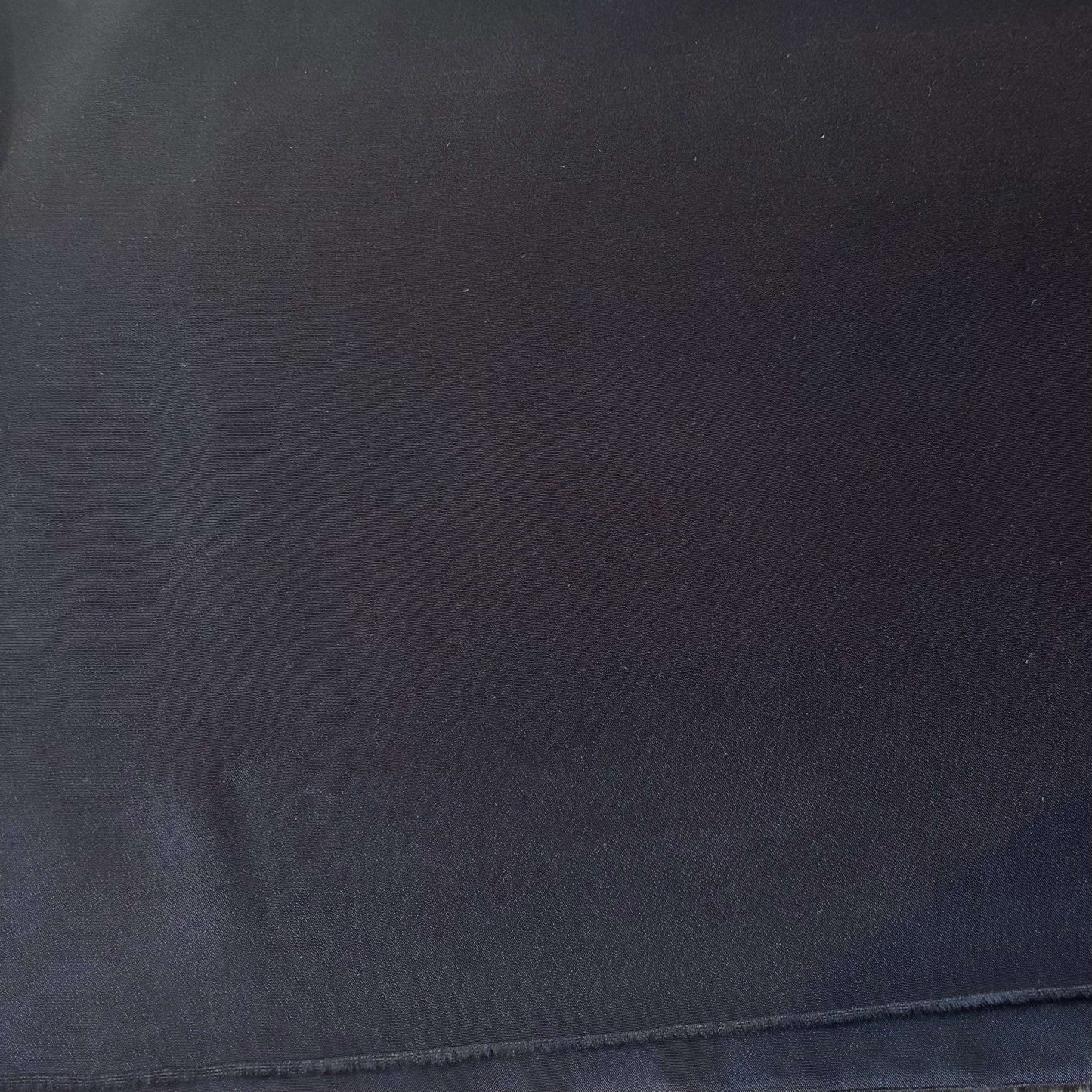 Showing Sylvie and silk and viscose like blended Crepe De Chine in a black shade