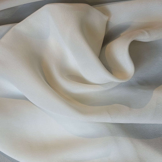 Showing Sylvie and silk and viscose like blended Crepe De Chine in a natural shade