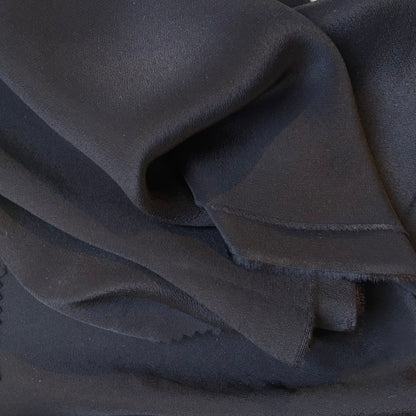 Exhibiting Sylvie and silk and viscose like blended Crepe De Chine in a black shade