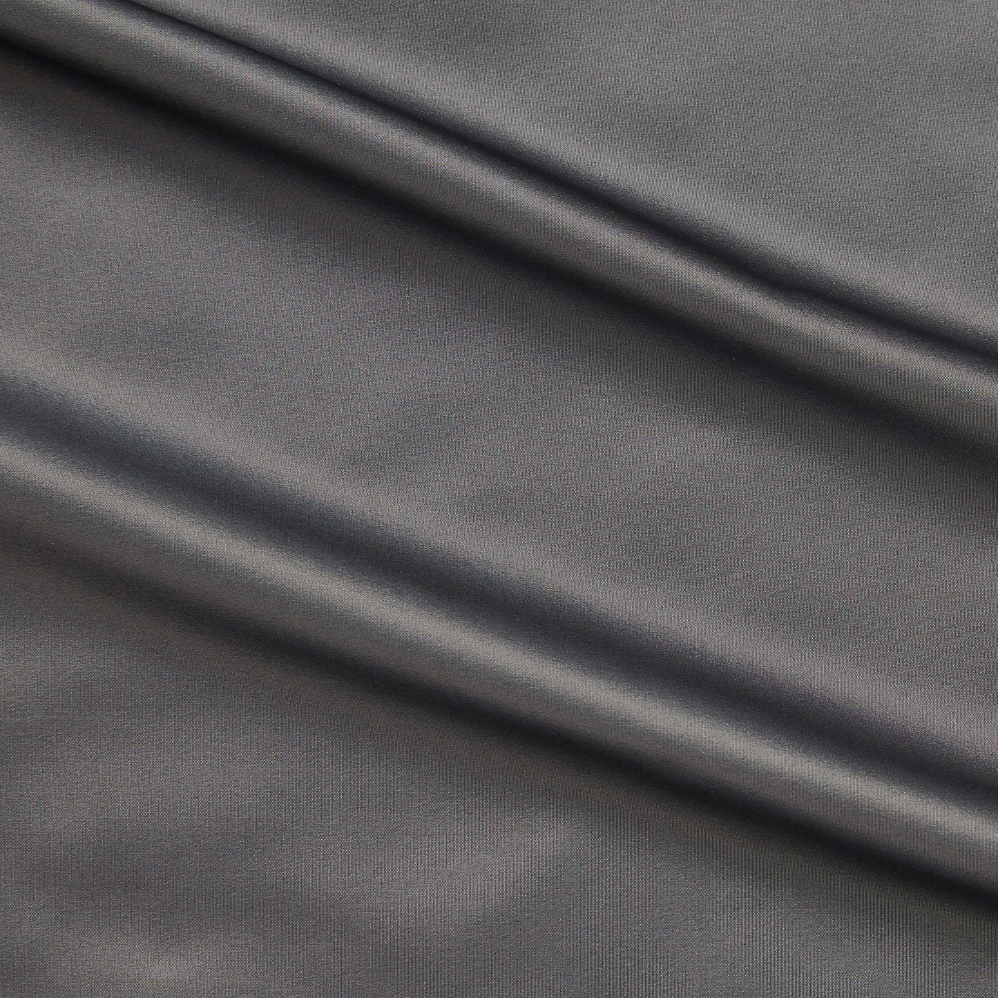 Tatler showing the plain taupe color version of a pure Polyester crisp smooth and lightweight shot taffeta with lustre