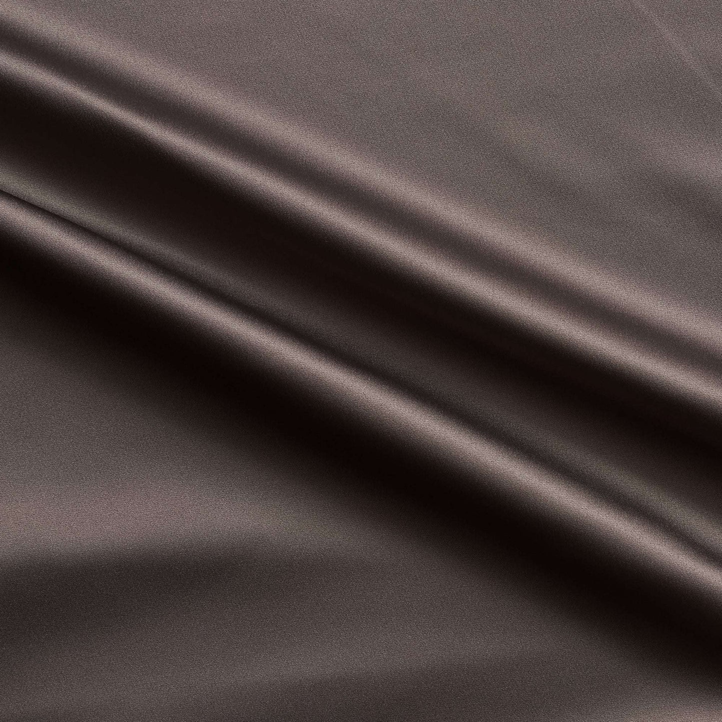 Trump showing the coffee color version of a stretch duchess satin polyester and lycra blend with a delustered smooth sateen finish and gutsy weight