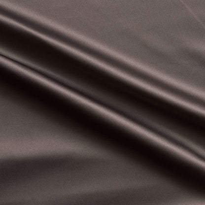Trump showing the coffee color version of a stretch duchess satin polyester and lycra blend with a delustered smooth sateen finish and gutsy weight