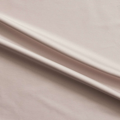 Trump showing the Diamond color version of a stretch duchess satin polyester and lycra blend with a delustered smooth sateen finish and gutsy weight