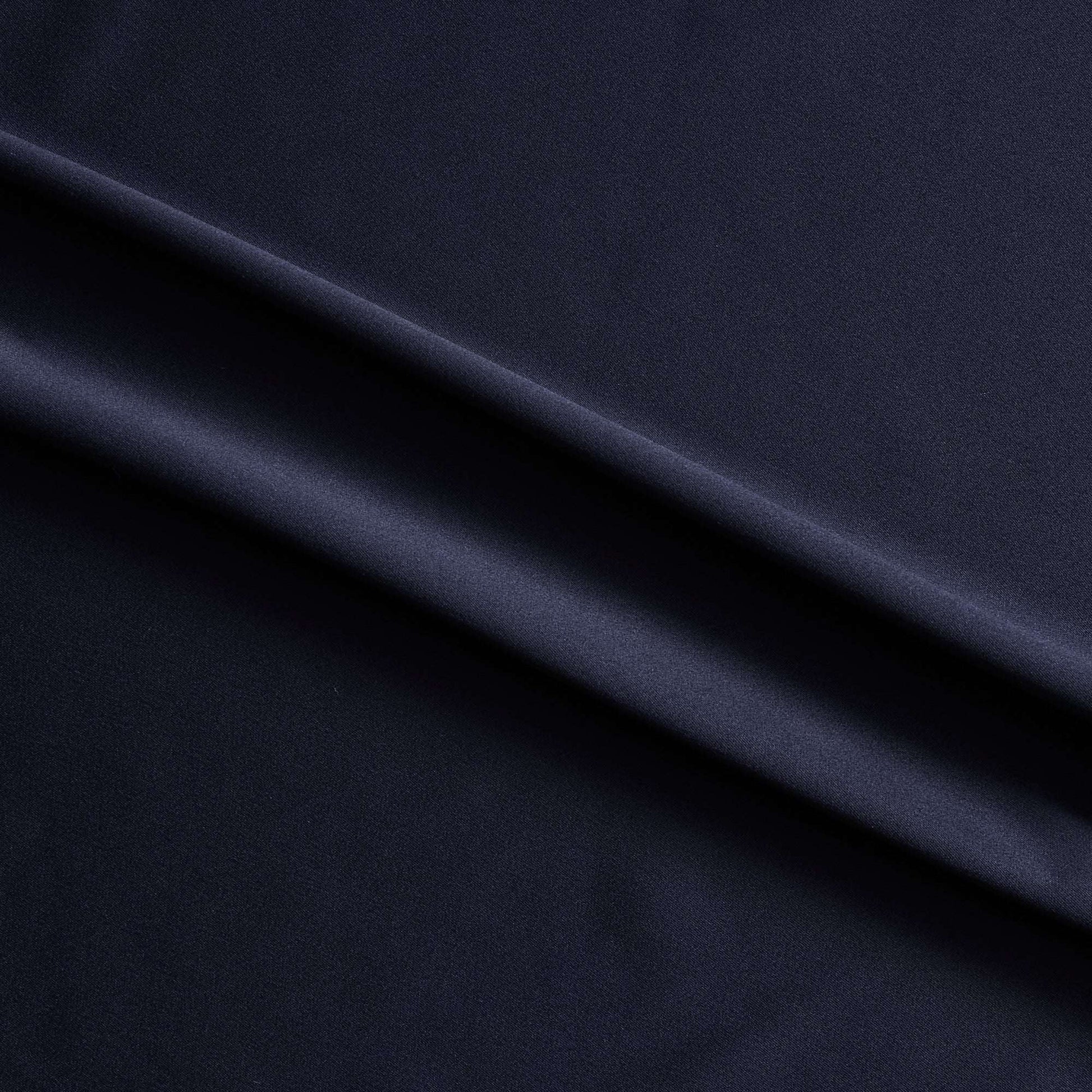 Trump showing the ink color version of a stretch duchess satin polyester and lycra blend with a delustered smooth sateen finish and gutsy weight